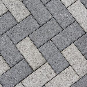 Detailed image of patio pavers featuring alternating shades of gray in South Jordan, Utah
