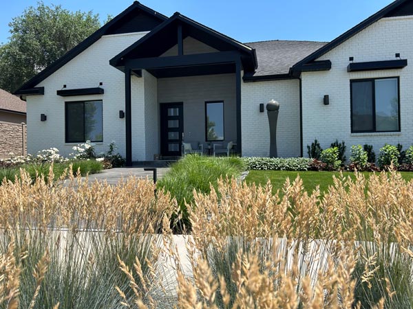An Exterior View of House and Garden Highlighting Landscape Design in Sandy, UT